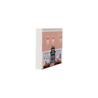 3/4" wooden replica with an illustration of a brick building on a white background