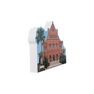 3/4" thick wooden illustration of a Red brick building with a palm tree