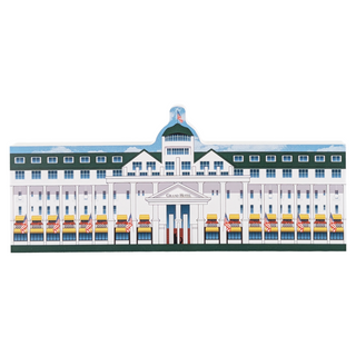 3/4" wooden replica with an illustration of a large building with a green roof on a white background