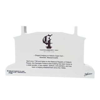 wooden replica with text on a white background about the candleberry inn on cape cod