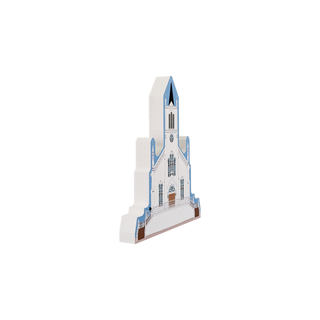 3/4" wooden replica with an illustration  of a church with a tall spire on a white background