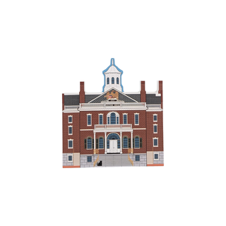 3/4" wooden replica with an illustration of  a brick building with a clock tower on a white background