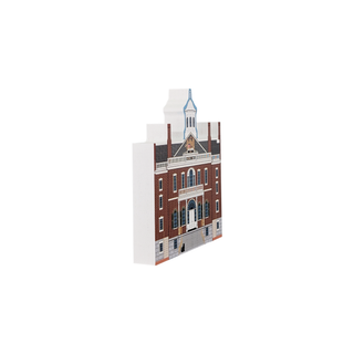 3/4" wooden replica with an illustration of  a brick building with a clock tower on a white background
