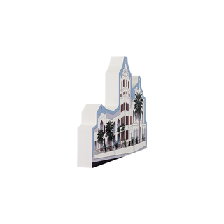 3/4" thick wooden Illustration of a coastal church building with palm trees on a white background