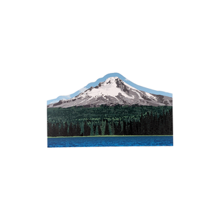 3/4" wooden cut out replica of an illustration of a snow covered mountain with a forest and lake 