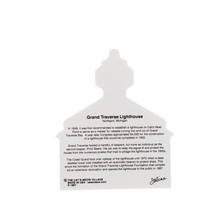 back of product with description of the grand traverse lighthouse in black text on a white background 