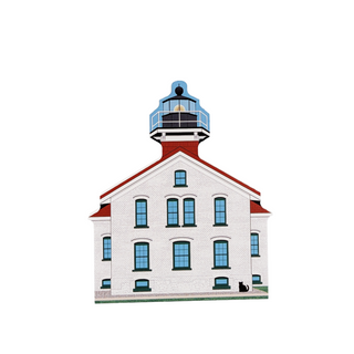 3/4" wooden replica with an illustration of a lighthouse on a white background