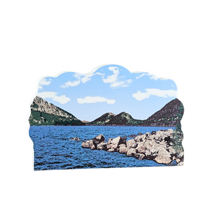 3/4" thick wooden scenic cutout of mountains, lake, and sky with clouds.