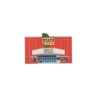 3/4" wooden replica with an illustration of a theater with 'State Theatre' sign on a white background