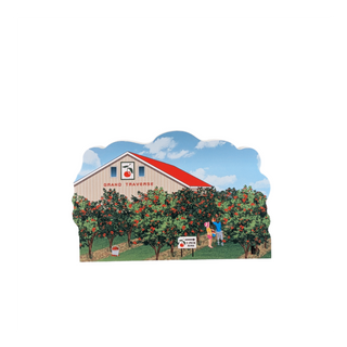 3/4" wooden replica with an illustration of a barn with a red roof and apple trees.
