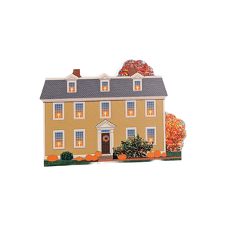 Decorative 3/4" thick wooden house with autumn decorations on a white background