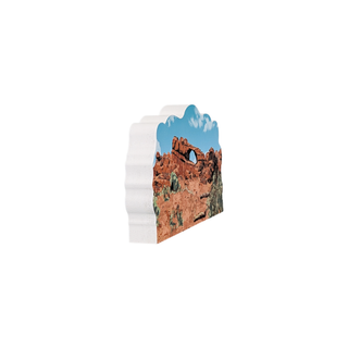 3/4" thick wooden illustration of a skyline arch and blue sky.