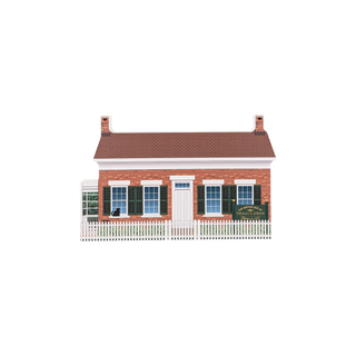 3/4" thick wooden illustration of a brick home on a white background