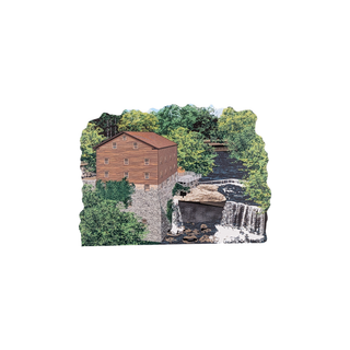 3/4" thick wooden illustration of a mill with scenery on a white background