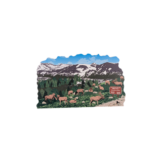 3/4" wooden replica with an illustration of a mountain landscape with animals on a white background