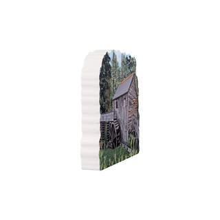 3/4" thick wooden illustration of a watermill with a wheel in a forest setting
