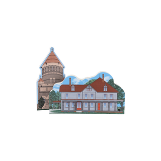 3/4" thick wooden illustration of a home and a monument on a white background