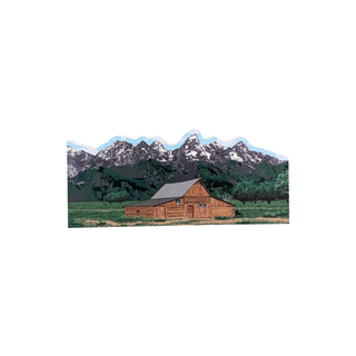 3/4" wooden replica with an illustration of a Wooden barn with mountains in the background on a white background