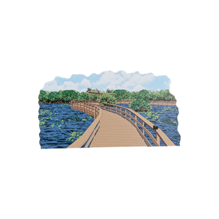 3/4" thick wooden illustration of a wooden trail over water on a white background