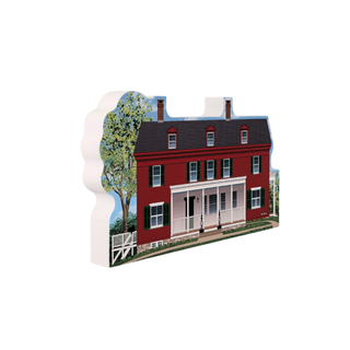 3/4" wooden replica with an illustration of Red house with white porch and green trees on a white background