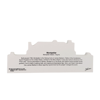 3/4" thick wooden cutout of  a large brick house with columns on a white background