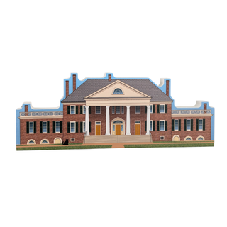 3/4" thick wooden cutout of  a large brick house with columns on a white background