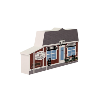 3/4" thick wooden Model of a restaurant building with a sign on a white background