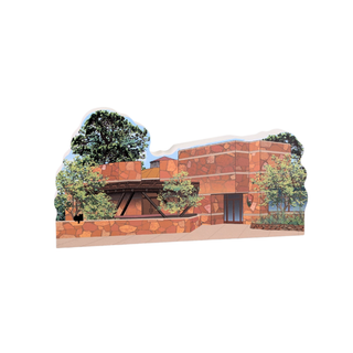 wooden replica with an illustration of a modern building with trees on a white background