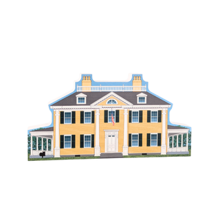 3/4" wooden replica with an illustration of a two-story house with yellow walls and white trim on a white background