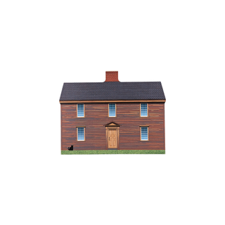 3/4" wooden replica with an illustration of a brick house with a brown door on a white background