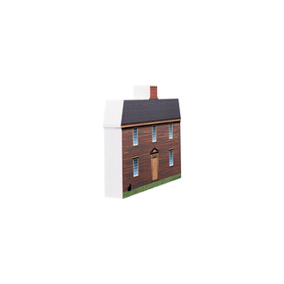 3/4" wooden replica with an illustration of a wooden two story house with brown front door 