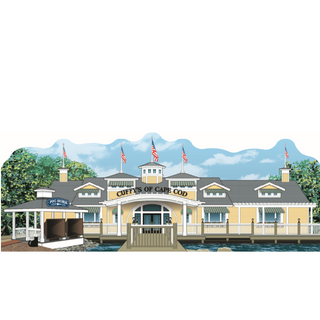 wooden replica with an Illustration of a building with 'Cuffy's of Cape Cod' sign, surrounded by trees  with a dock and water .