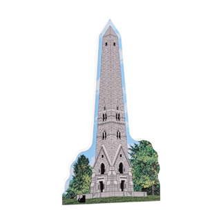 3/4" thick wooden cutout  of a tall stone tower with trees in the background