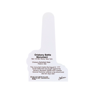 back of product with printed information about the Oriskany Battle Monument in Rome, New York, including location details, historical context, and a signature.