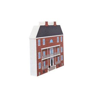 3/4" thick wooden replica with an illustration of A miniature brick house model with a dark gray roof, white side walls, and blue window details, shown against a plain white background.