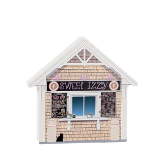 wooden replica with an Illustration of a small store named 'Sweet Izzy' with text about ice cream flavors 