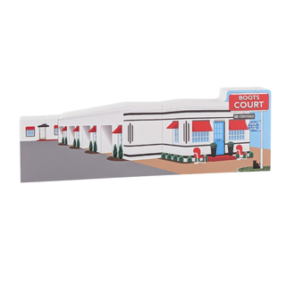 3/4" thick wood Model of a row of shops with a 'Boots Court' sign on a white background