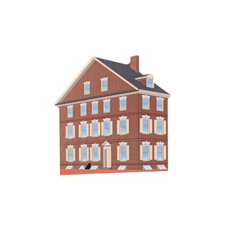3/4" thick wooden cutout of a brick house with multiple windows on a white background