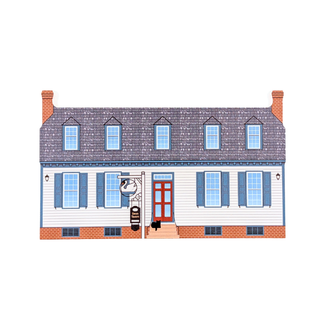 3/4" thick wooden replica with an illustration of a historic two-story house facade with white siding, blue shutters, a gray shingled roof, brick chimneys and foundation, a red front door, and a hanging sign, shown on a plain white background.