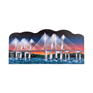 3/4" thick wooden replica with an illustration of a modern cable-stayed bridge over water at sunset, with a starry night sky and orange-red horizon, shown on a plain white background.