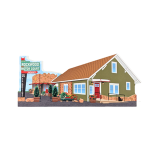 3/4" thick wooden replica with an illustration of  'Rockwood Motor Court' with a green house, brown roof, red door, signpost, and small vehicle, shown on a plain white background.