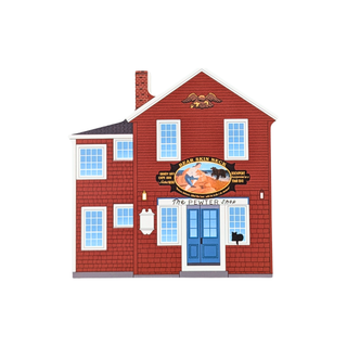 3/4" thick wooden replica with an illustration of a red brick house with white trim, blue doors, multiple white-framed windows, a brick chimney, and a large decorative front sign reading 'The Power 1989' with 'Drug Free School' and additional text. The house is centered on a plain white background.