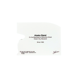 back of product featuring black printed text with the address 'On the Boardwalk at Wicomico Street, Ocean City, Maryland, Since 1933' and a small signature in the lower right.