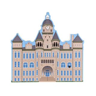 3/4" thick wooden replica with an illustration of a  historic brick clock tower building with blue windows and roofs, isolated on a white background.