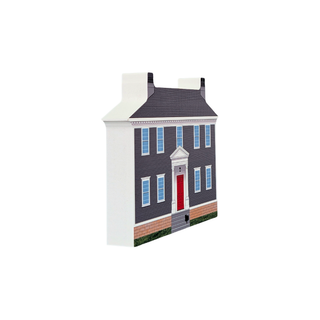 3/4" thick wooden replica with an illustration of a classic two-story house with dark gray siding, a red front door, white trim, and a dark gray roof, shown against a plain white background.