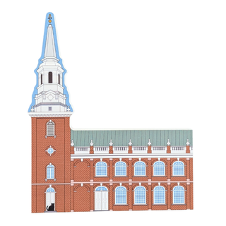 3/4" thick wooden replica with an illustration of a red brick church building with a tall white spire, blue trim, and a green roof, isolated on a white background.