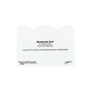 back of product with black printed text that reads 'Boardwalk Arch' along with location details and a small signature, shown on a plain white background.