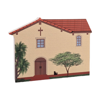 3/4" thick wooden illustration of a church on a white background