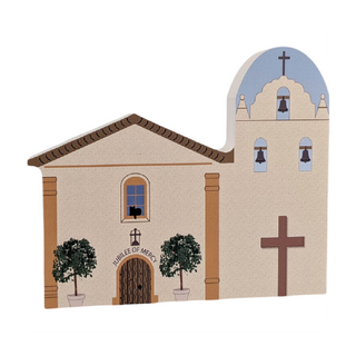 3/4" thick wooden model of a church with a cross on a white background