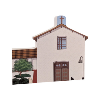 3/4" thick wooden illustration of a church on a white background
